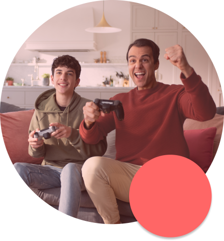 Father and son playing video game on internet