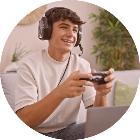 Teenage boy playing video game