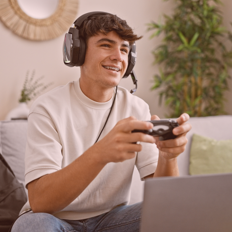 teenage boy playing video games